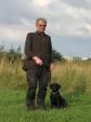 Mr. Arne Larsen and <a href="/ajaxhund.php?hund=Ravensbank%20Vita" data-toggle="modal" data-target="#myModal" data-remote="false" >Ravensbank Vita (Bibie)</a> attending puppy training with the very young <a href="/ajaxhund.php?hund=Ravensbank%20Vita" data-toggle="modal" data-target="#myModal" data-remote="false" >Ravensbank Vita (Bibie)</a>, 3 months old. <span id="copyright">&copy;Anne Iversen</span>