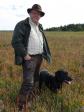 Steen Rydahl og <a href="/ajaxhund.php?hund=Ravensbank%20Duff" data-toggle="modal" data-target="#myModal" data-remote="false" >Ravensbank Duff (Duff)</a> på dagen hvor de opnår Duffs første 1. pr. i åben klasse på B-prøve.  <span id="copyright">&copy;Steen Rydahl</span>