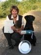 Charlotte Rasmussen og <a href="/ajaxhund.php?hund=Ravensbank%20Sir%20Kay" data-toggle="modal" data-target="#myModal" data-remote="false" >Ravensbank Sir Kay (Tino)</a> på dagen hvor de to først består kvalifikationsprøven, og dernæst bliver dagens bedste hund i åben klasse på B-prøve. <span id="copyright">&copy;Charlotte Rasmussen</span>